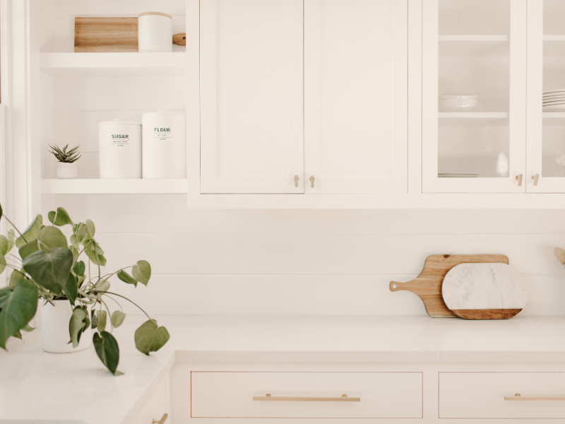 a photo of a clean white kitchen